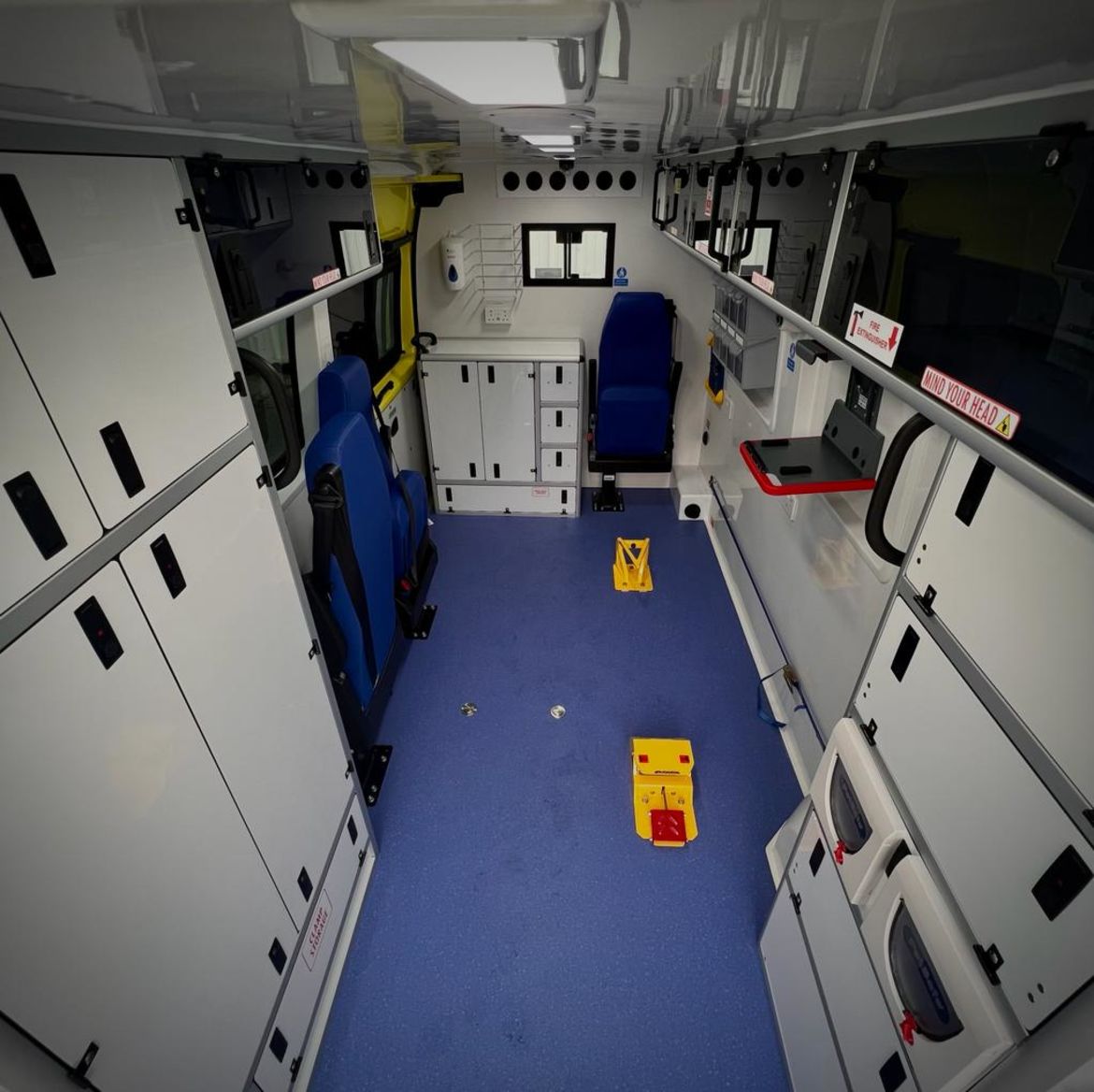 Rear patient compartment, stowage units and passenger comfort